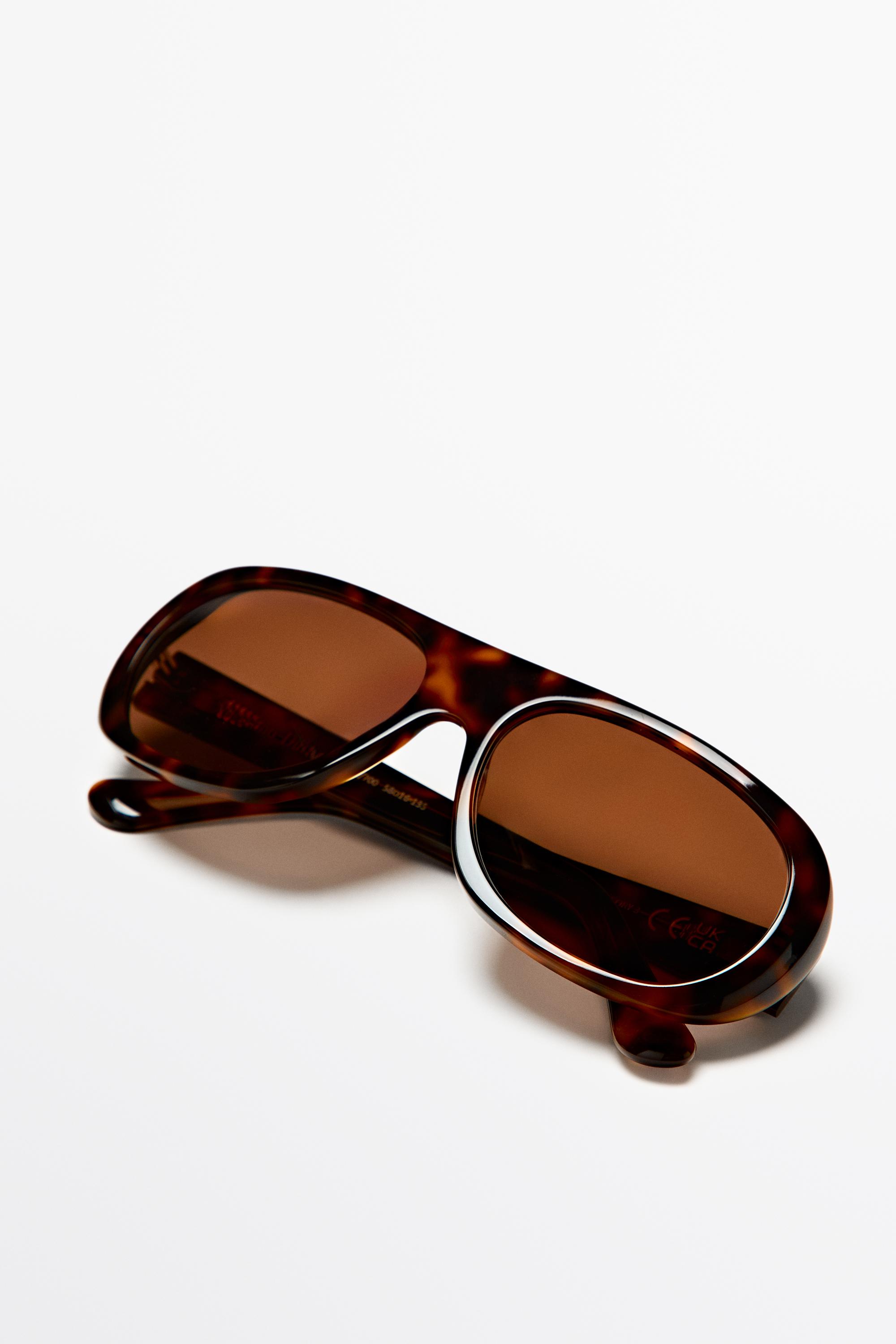 Lunettes de soleil ovales effet écaille